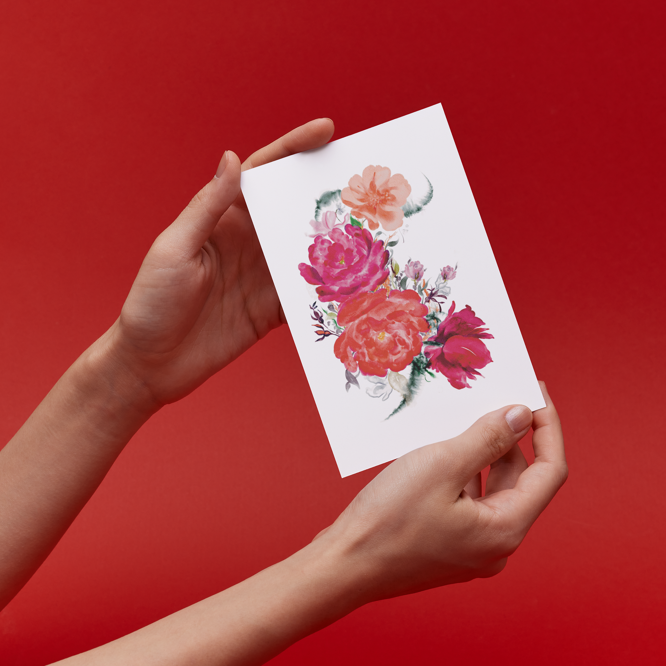 Hands holding a beautiful original floral illustration 
